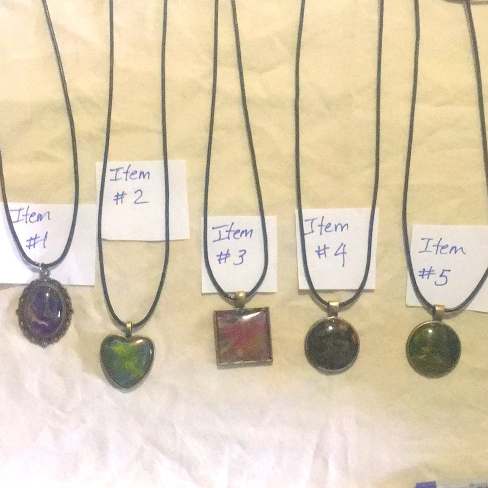 Beautiful pendants with Dutch pour paints.